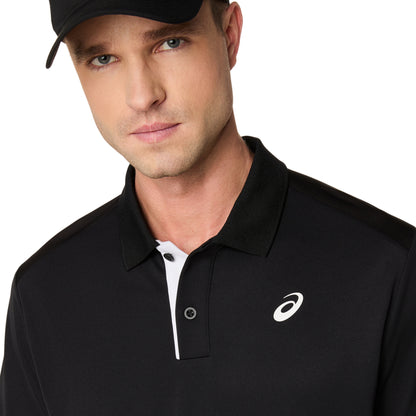 Man wearing a black polo shirt with a logo on a white background