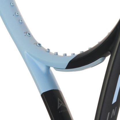Close-up of a Head tennis racket with a light blue and black design on a white background
