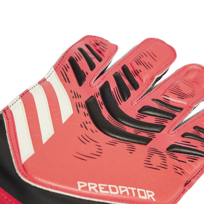 Red goalkeeper gloves with black and white accents on a white background