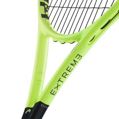 Close-up of a Head tennis racket showing the bright neon yellow-green frame with black strings and black text reading 'EXTREME' and 'ELITE' on a white background.