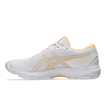A white ASICS netball shoe with metallic gold stripes and a light peach-orange collar, shown in a side profile on a white background.