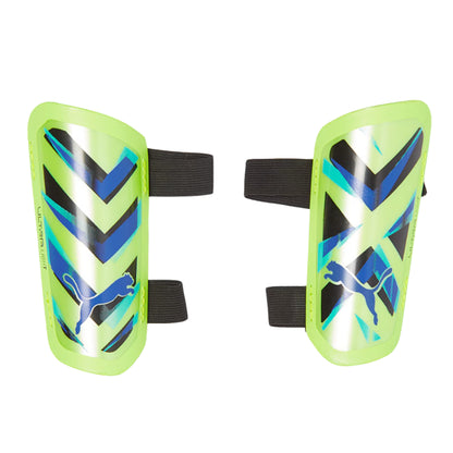 Pair of green shin guards with black and blue patterns on a white background