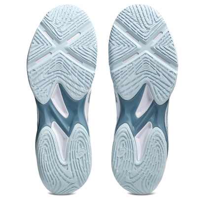 Close-up of blue squash shoes with tread pattern on a white background