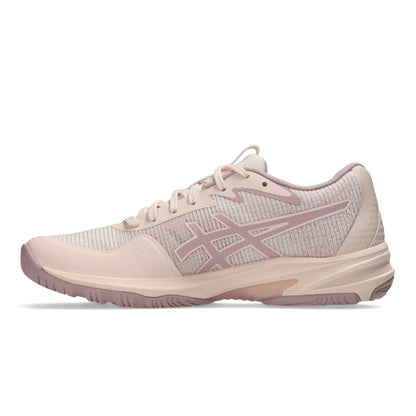 Pink netball shoe on a white background