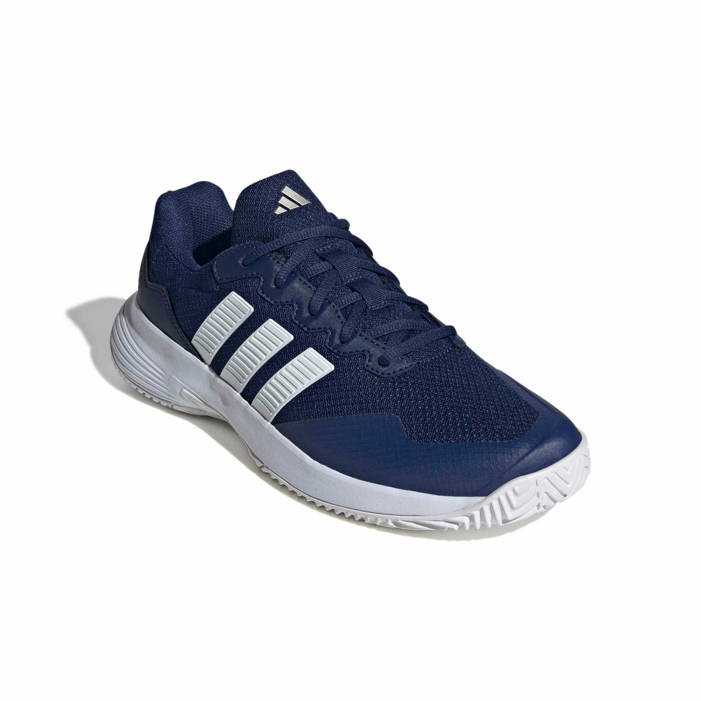 Navy blue tennis shoe with white stripes on a white background