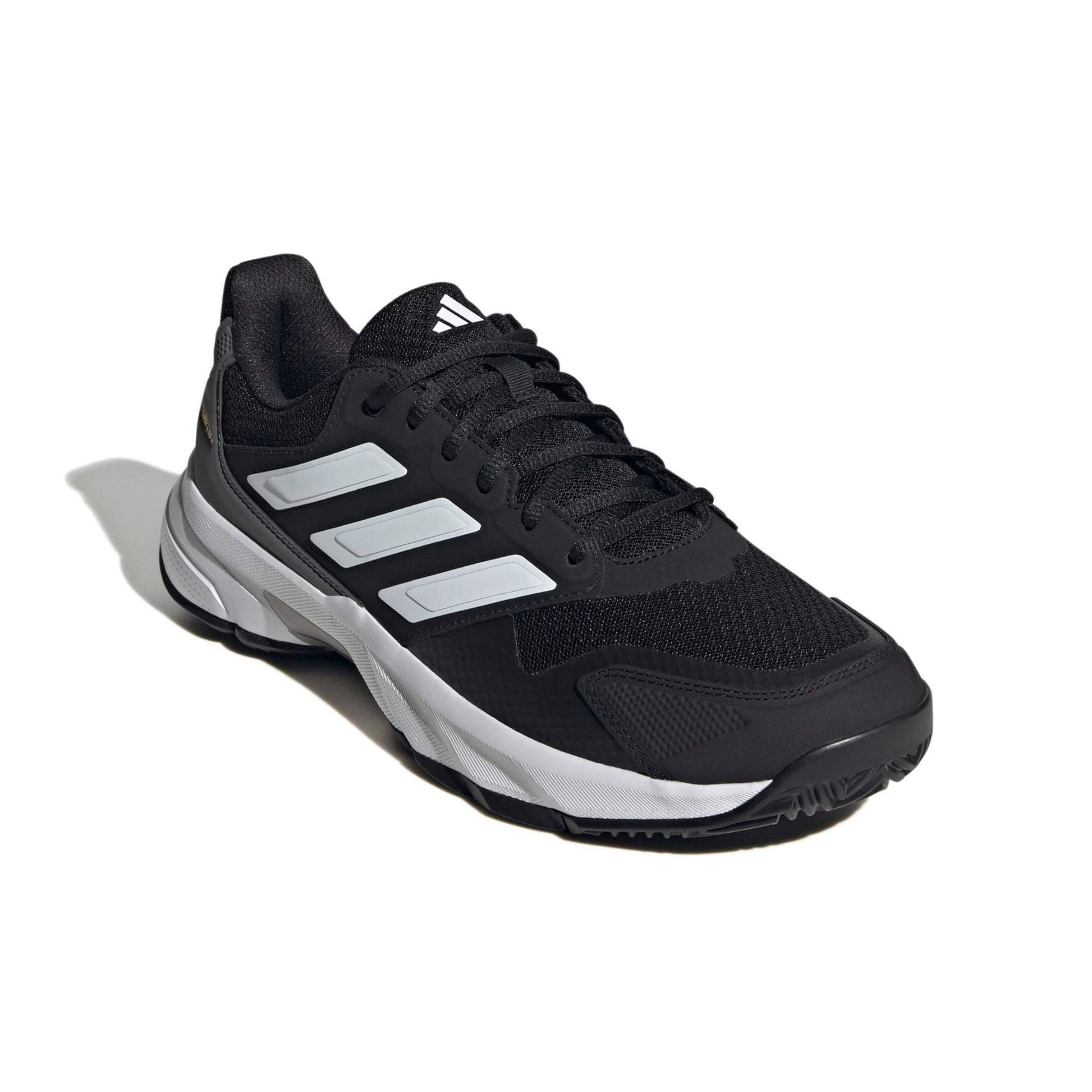 A black Adidas tennis shoe with three white stripes, black laces, and a white and black midsole, shown on a white background with a soft shadow.