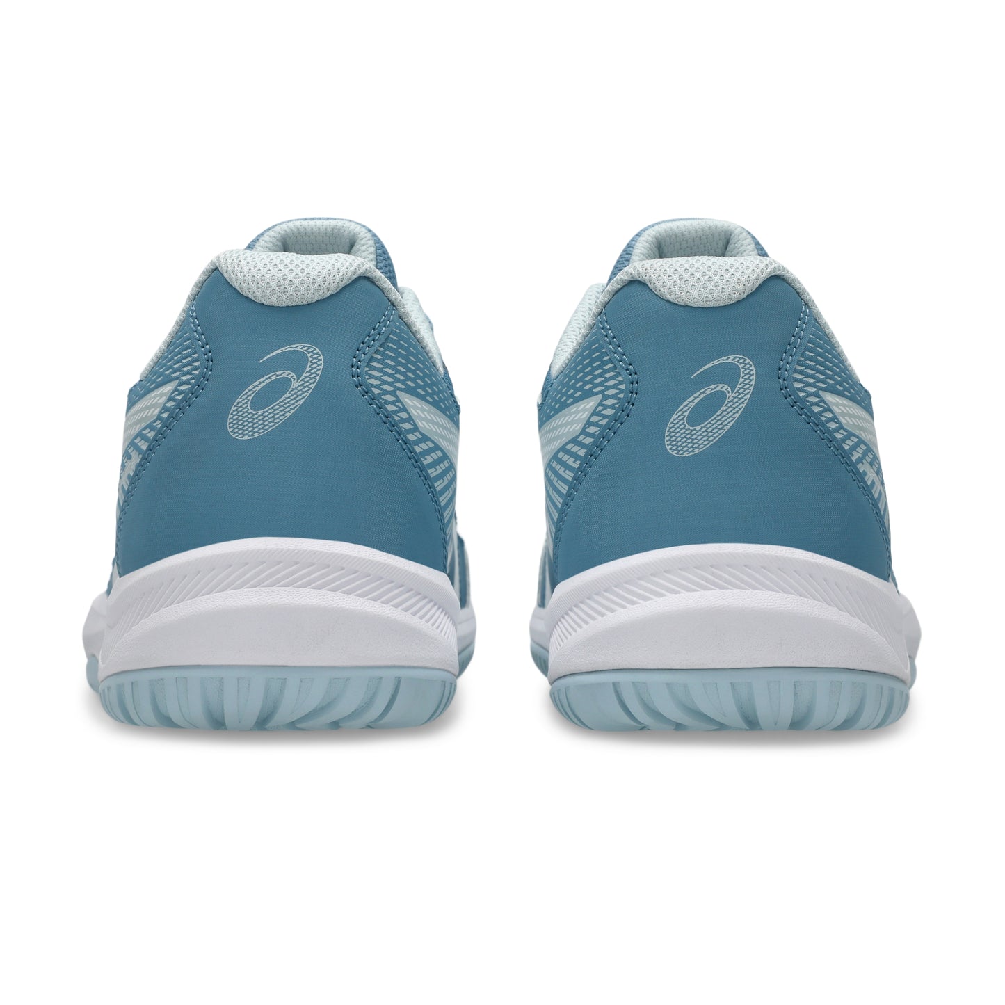 Pair of blue squash shoes with white soles on a white background