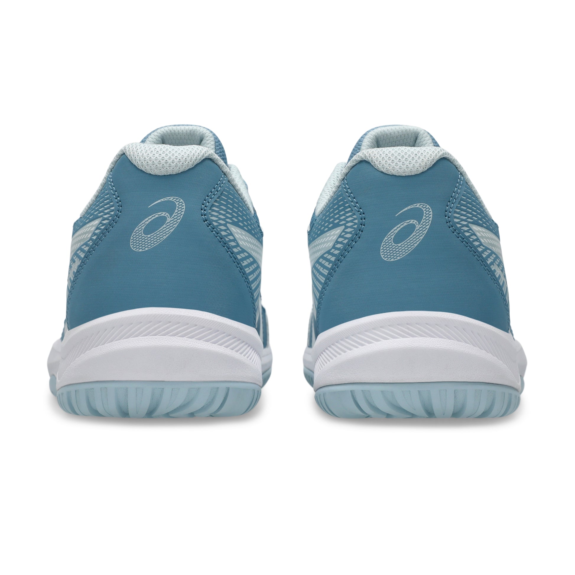 Pair of blue squash shoes with white soles on a white background