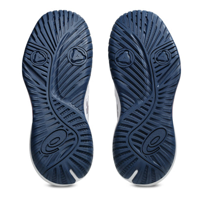 A pair of tennis shoes shown from the bottom, displaying their dark navy blue textured rubber soles against a clean white background.